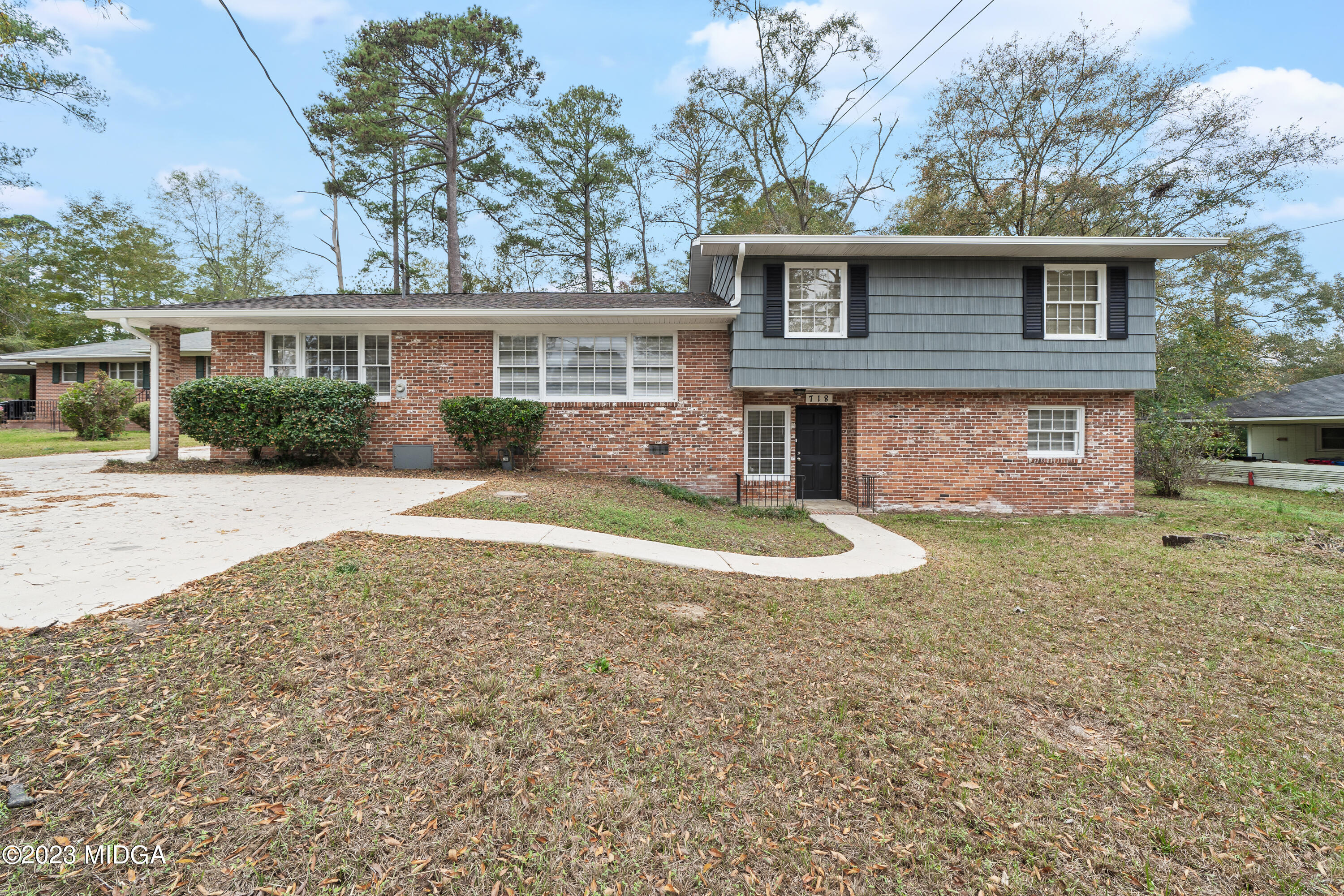 718 Woodhaven Road Macon, GA 31204 - Photo 1 of 37 Brick and wood siding front view