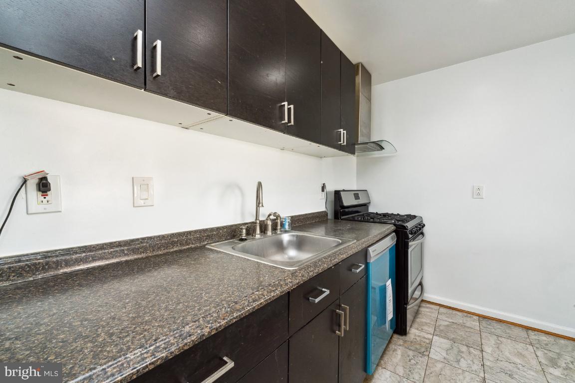 9278 Adelphi Road, Unit 301 Hyattsville, MD 20783 - Photo 14 of 35 Kitchen