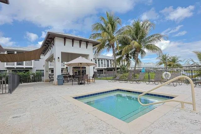 a view of a house with swimming pool