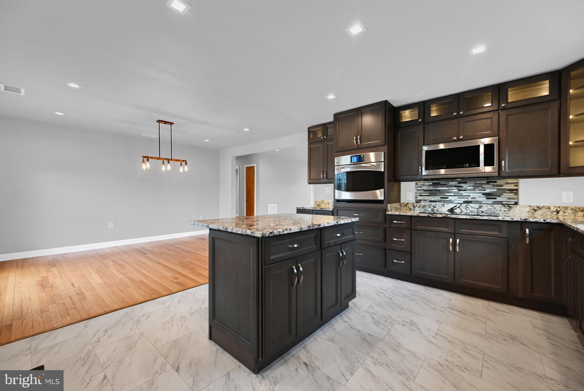 4684 Linthicum Road Dayton, MD 21036 - Photo 14 of 39 Open flow throughout living, dining & kitchen