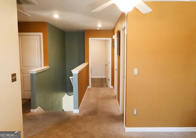 a bedroom with bed and a couch