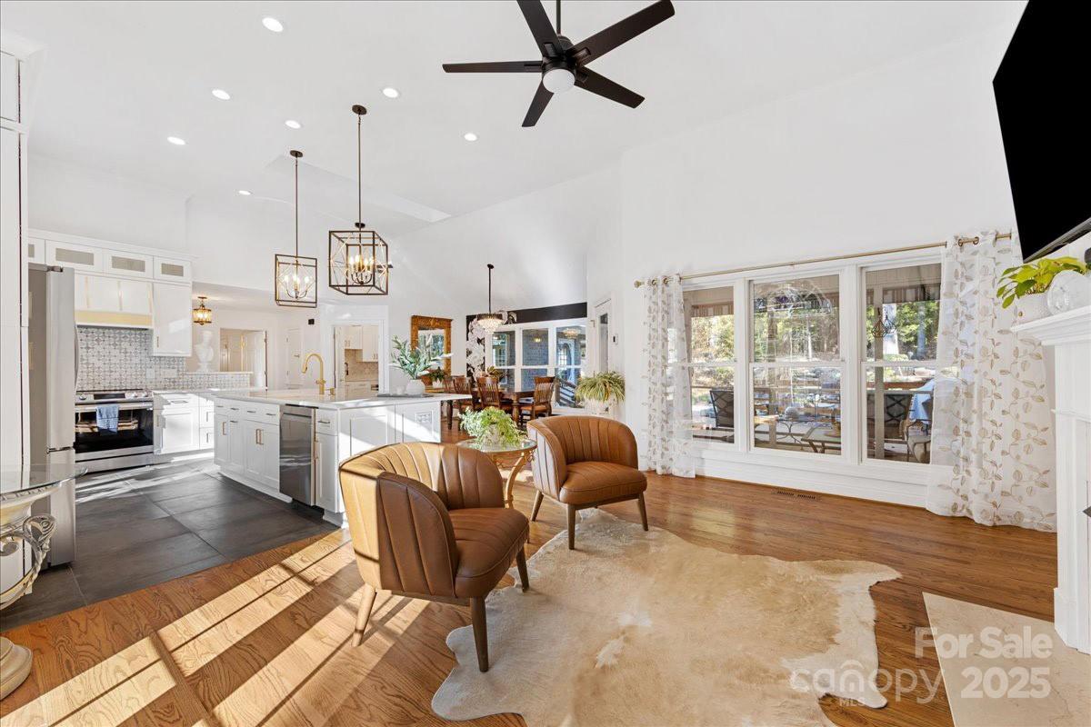 9701 Deer Run Road Waxhaw, NC 28173 - Photo 19 of 47 a living room with furniture and a flat screen tv