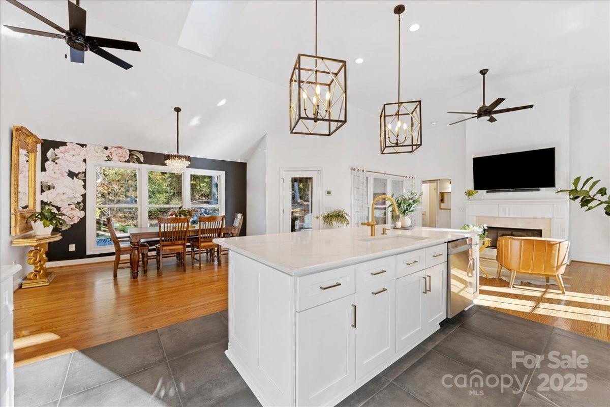 9701 Deer Run Road Waxhaw, NC 28173 - Photo 23 of 47 a living room with furniture and a flat screen tv