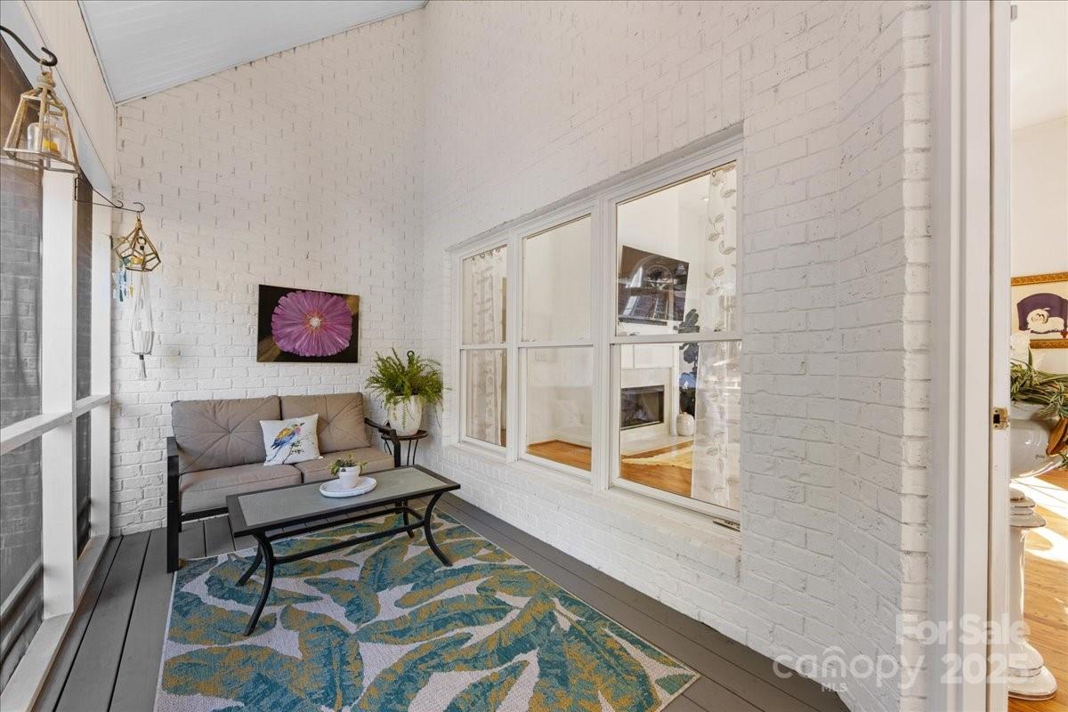 9701 Deer Run Road Waxhaw, NC 28173 - Photo 25 of 47 a living room with furniture and a flat screen tv