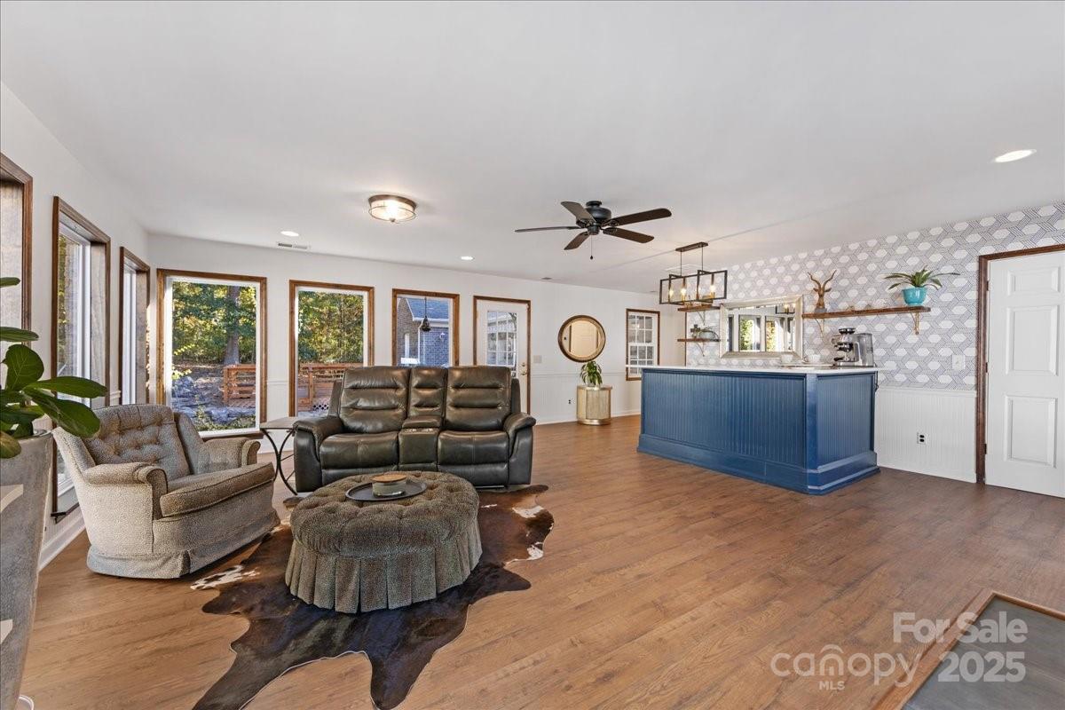 9701 Deer Run Road Waxhaw, NC 28173 - Photo 35 of 47 a living room with furniture and a large window