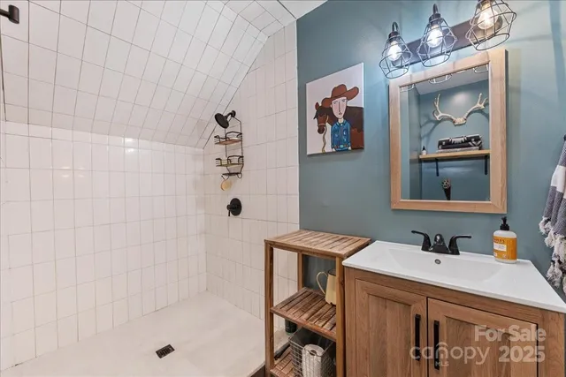 a view of a chairs and table in the backyard