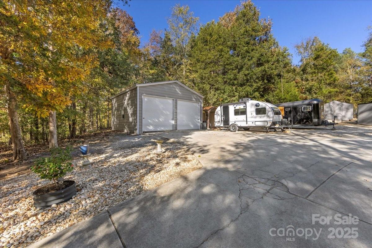 9701 Deer Run Road Waxhaw, NC 28173 - Photo 45 of 47 a view of a house with a yard
