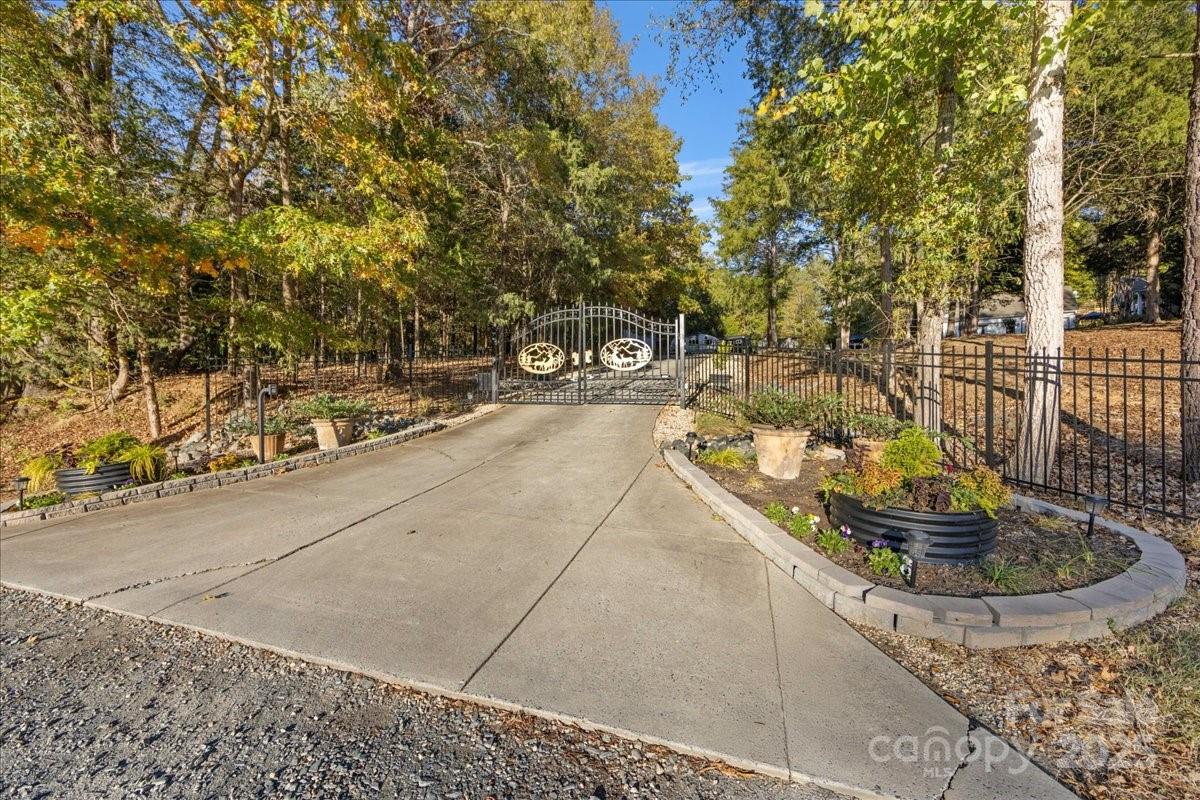 9701 Deer Run Road Waxhaw, NC 28173 - Photo 5 of 47 a view of swimming pool with a patio