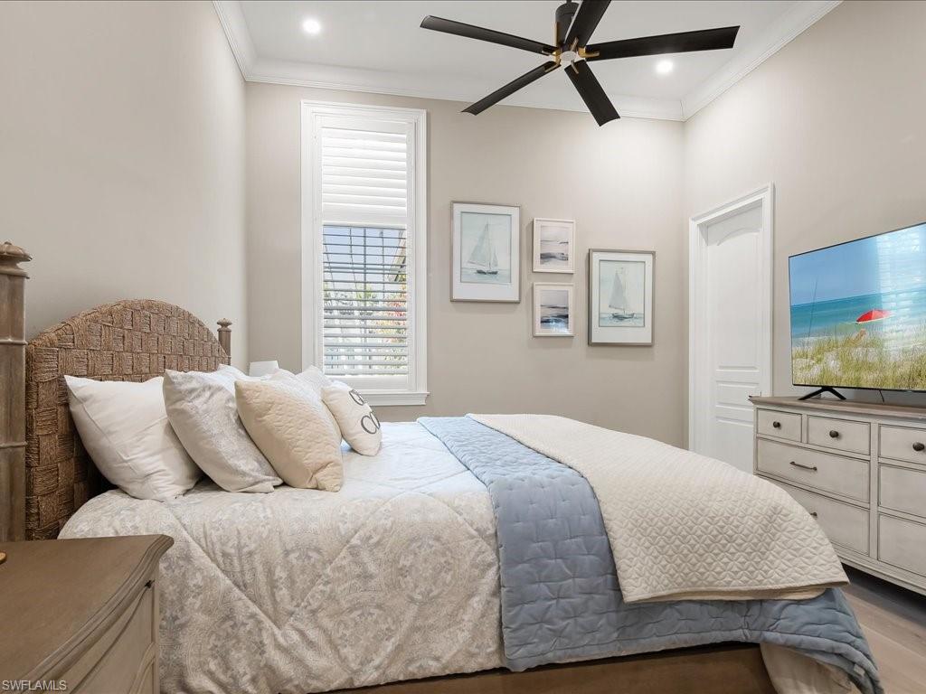 2822 Capistrano Way Naples, FL 34105 - Photo 27 of 47 Guest Bedroom with ensuite bathroom.