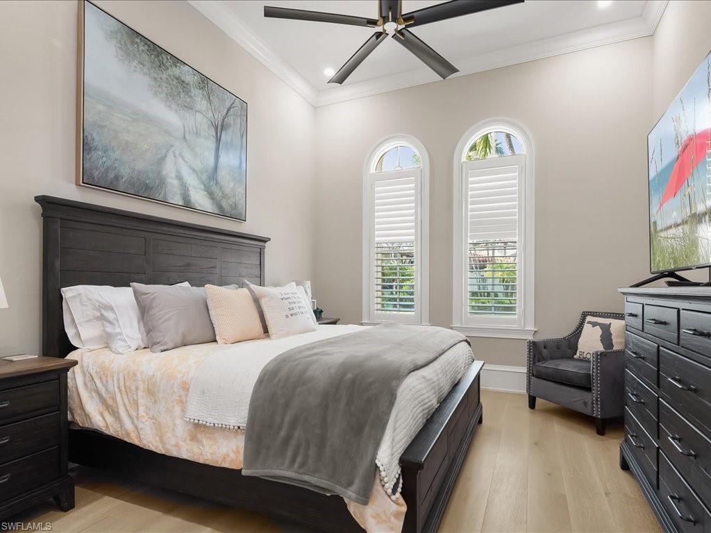 2822 Capistrano Way Naples, FL 34105 - Photo 30 of 47 Second Guest bedroom with ensuite bathroom and European White Oak wood flooring.