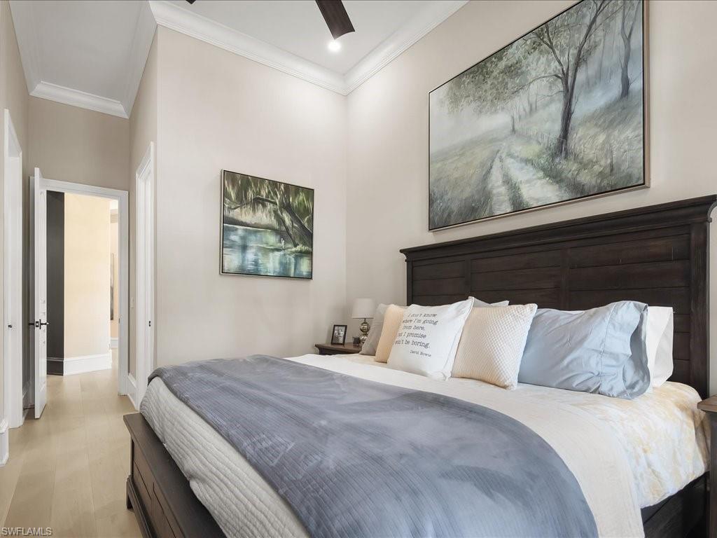 2822 Capistrano Way Naples, FL 34105 - Photo 31 of 47 Second Guest bedroom with ensuite bathroom and European White Oak wood flooring.