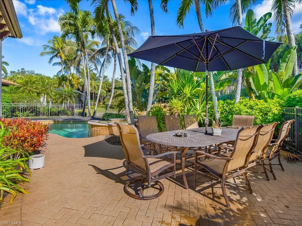 2822 Capistrano Way Naples, FL 34105 - Photo 41 of 47 View of patio / terrace featuring outdoor dining area