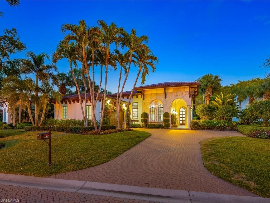 2822 Capistrano Way Naples, FL 34105 - Photo 42 of 47 Twilight view of the front of the home