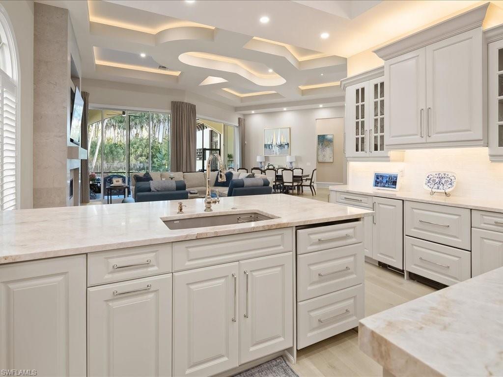 2822 Capistrano Way Naples, FL 34105 - Photo 7 of 47 Kitchen, looking into the Dining room with a raised ceiling, European White Oak wood flooring