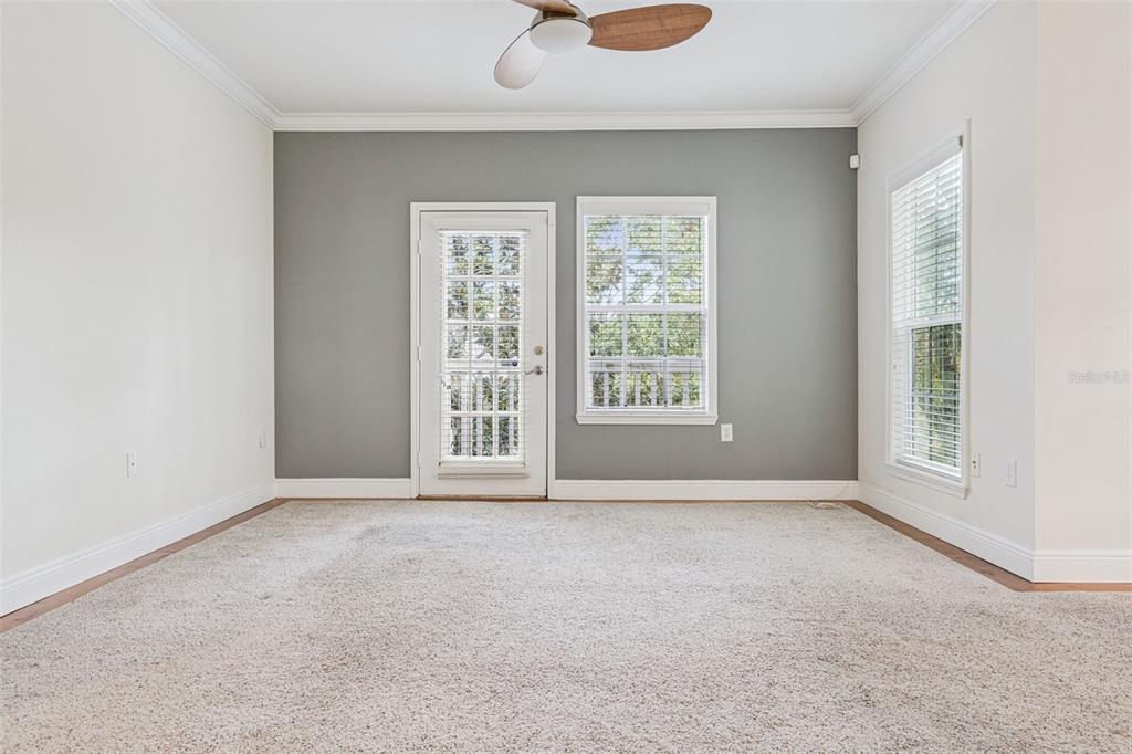 414 Water Street, Unit 414 Celebration, FL 34747 - Photo 25 of 75 an empty room with windows