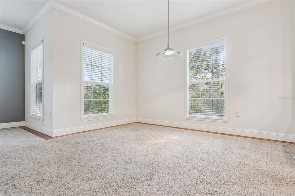 414 Water Street, Unit 414 Celebration, FL 34747 - Photo 26 of 75 an empty room with windows