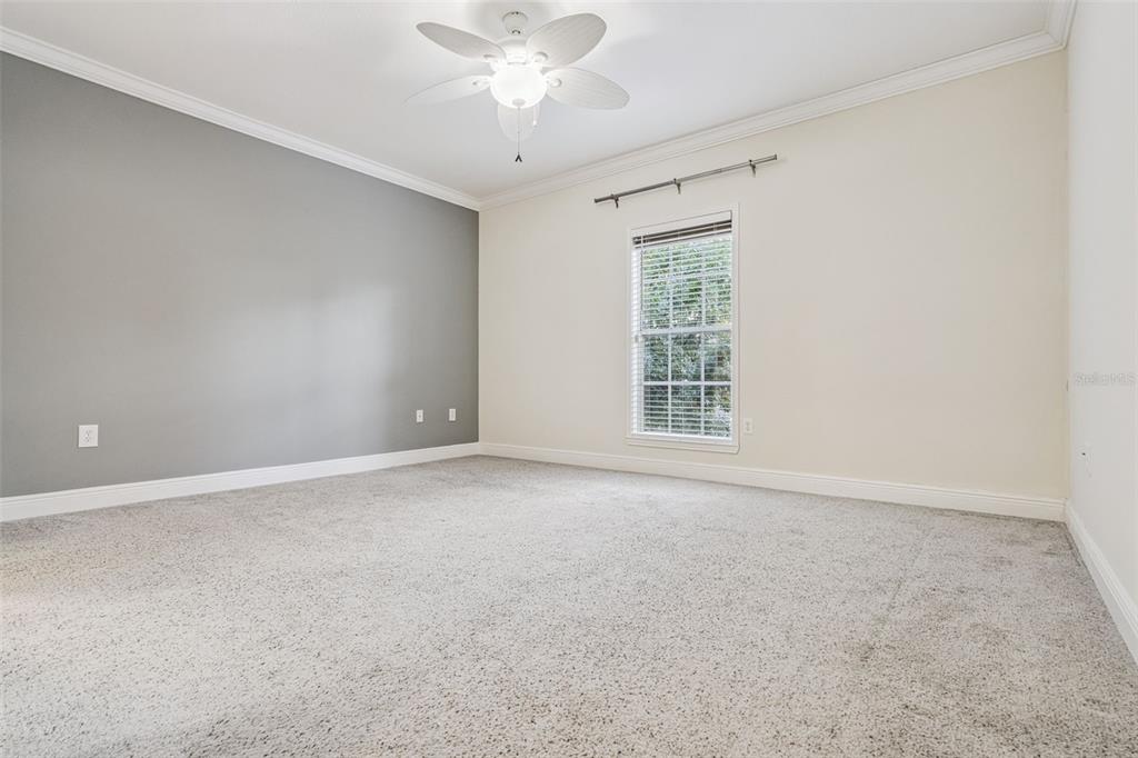 414 Water Street, Unit 414 Celebration, FL 34747 - Photo 28 of 75 a view of an empty room with a window