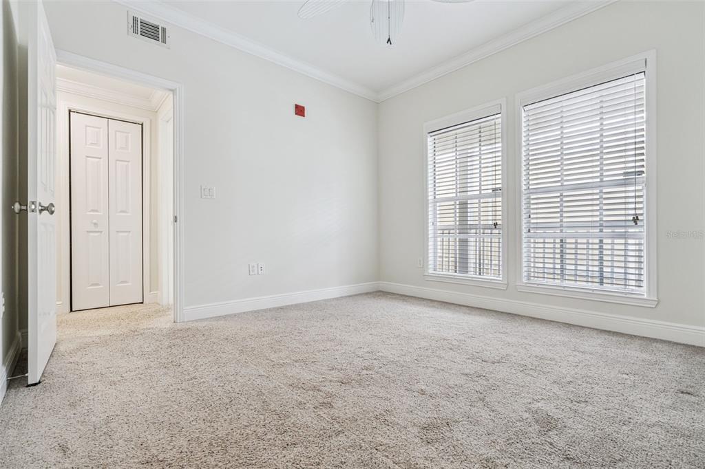 414 Water Street, Unit 414 Celebration, FL 34747 - Photo 37 of 75 an empty room with windows