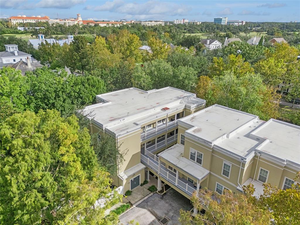 414 Water Street, Unit 414 Celebration, FL 34747 - Photo 51 of 75 an aerial view of a house with a yard