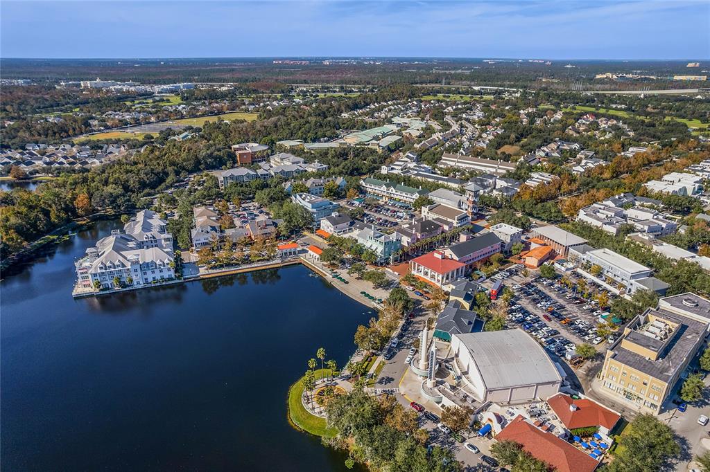 414 Water Street, Unit 414 Celebration, FL 34747 - Photo 63 of 75 an aerial view of residential houses with outdoor space