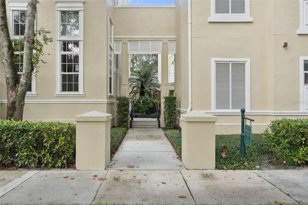 414 Water Street, Unit 414 Celebration, FL 34747 - Photo 7 of 75 a front view of a house with a yard