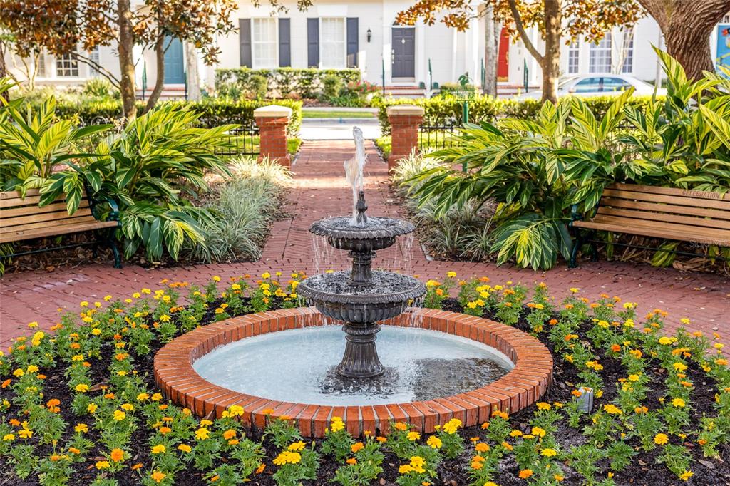 414 Water Street, Unit 414 Celebration, FL 34747 - Photo 73 of 75 a view of a fountain in the yard of a house