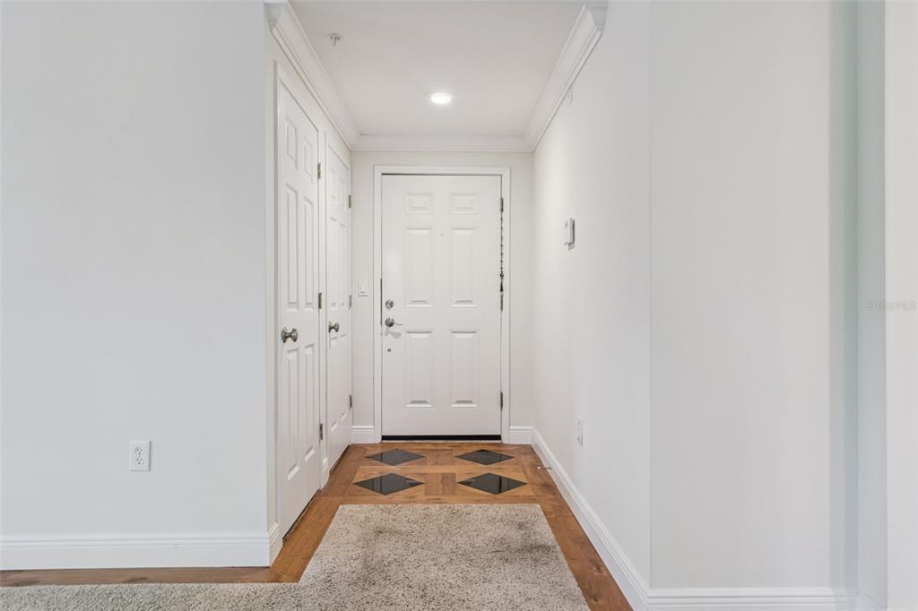 414 Water Street, Unit 414 Celebration, FL 34747 - Photo 10 of 75 a view of hallway with granite countertop