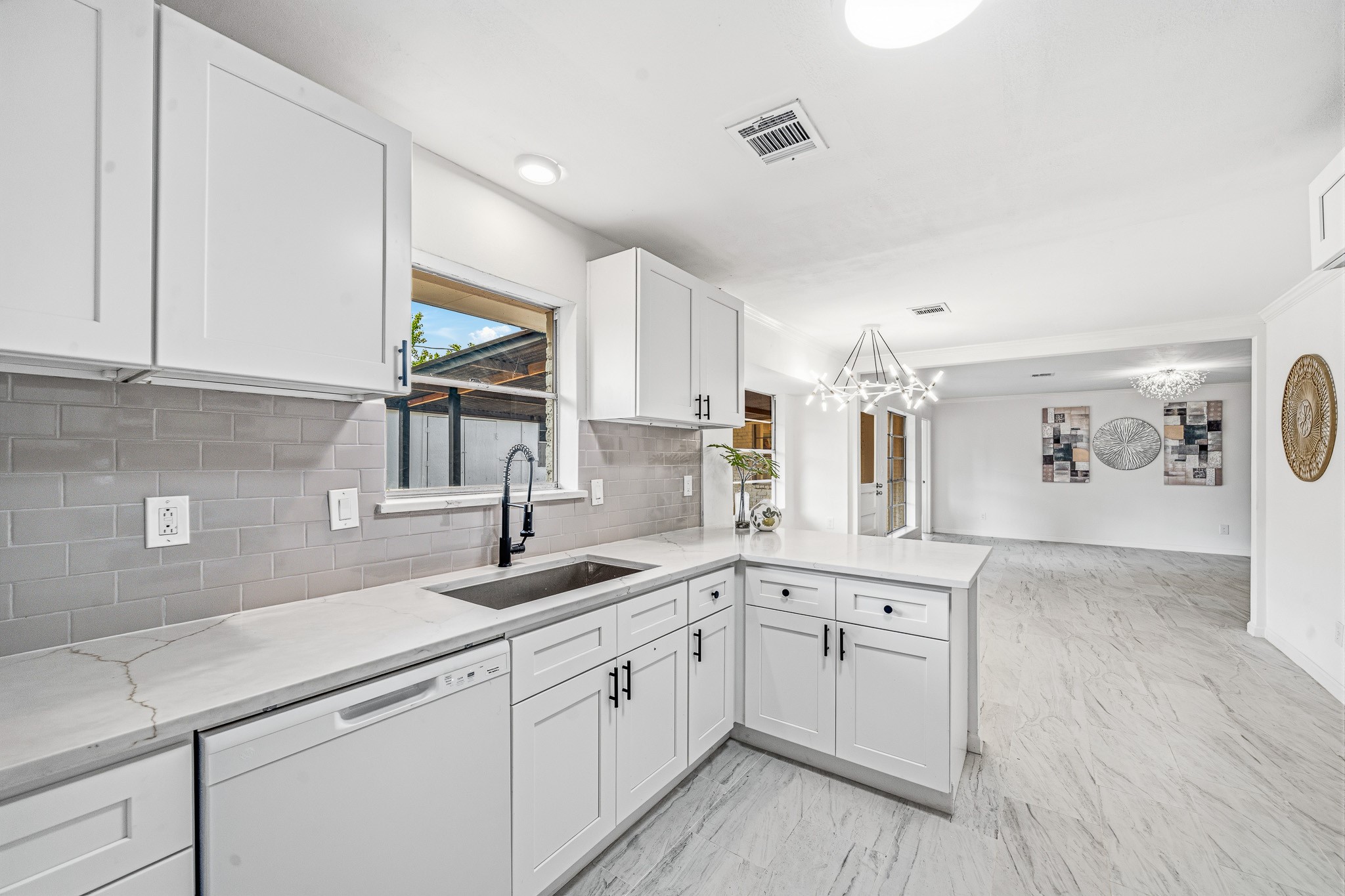 111 Princess Drive Houston, TX 77034 - Photo 18 of 30 a kitchen with a sink cabinets and wooden floor