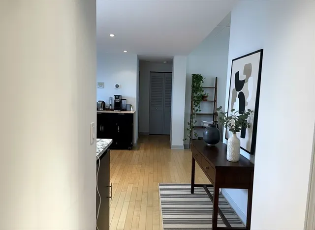 a view of a hallway with workspace