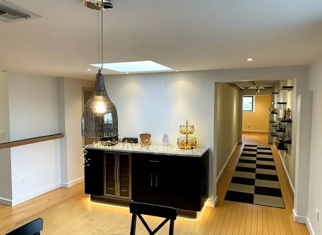 a kitchen with sink and cabinets