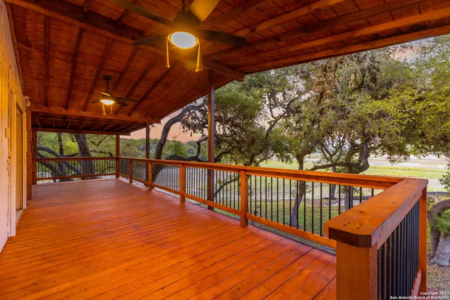 a view of swimming pool from a balcony