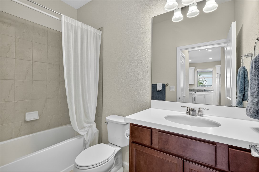 5130 Unity Square Vero Beach, FL 32967 - Photo 20 of 36 a bathroom with a sink toilet and shower