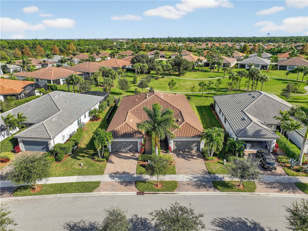 5130 Unity Square Vero Beach, FL 32967 - Photo 2 of 36 an aerial view of residential houses with outdoor space