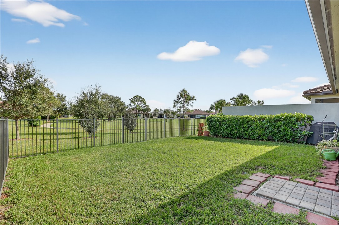 5130 Unity Square Vero Beach, FL 32967 - Photo 28 of 36 a view of a golf course with a play ground