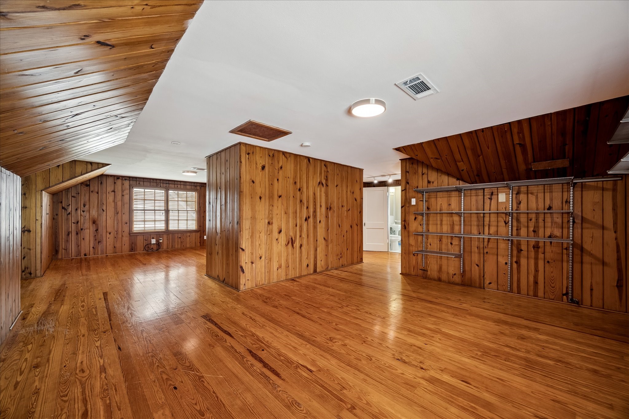 2202 Colquitt Street Houston, TX 77098 - Photo 10 of 19 a view of entryway with wooden floor