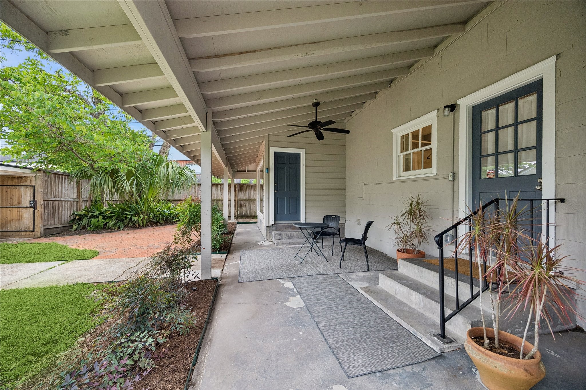 2202 Colquitt Street Houston, TX 77098 - Photo 13 of 19 a view of a patio with chairs and potted plants