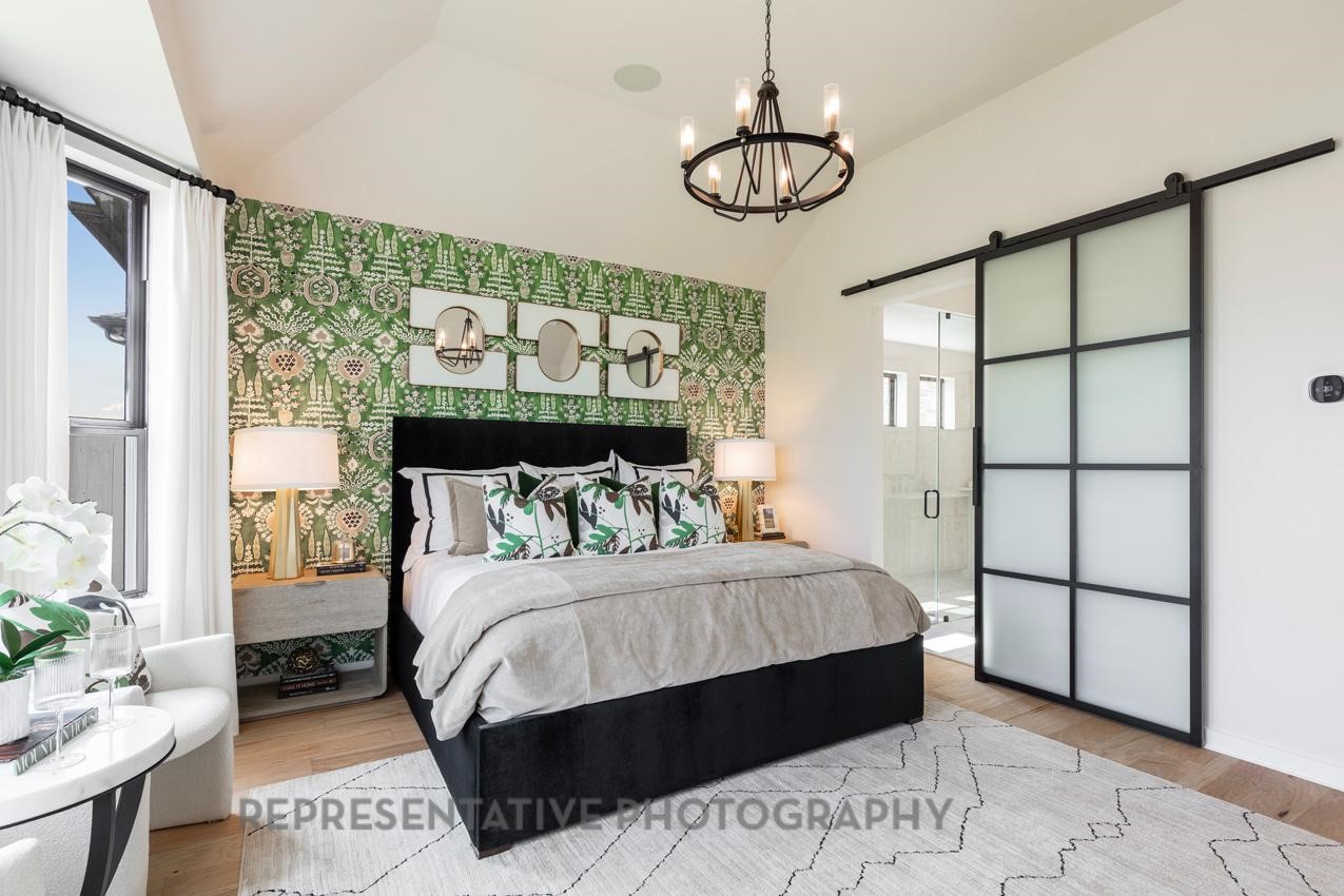 5327 Mango Blfs Street Manvel, TX 77578 - Photo 19 of 46 a bedroom with a large bed and a window