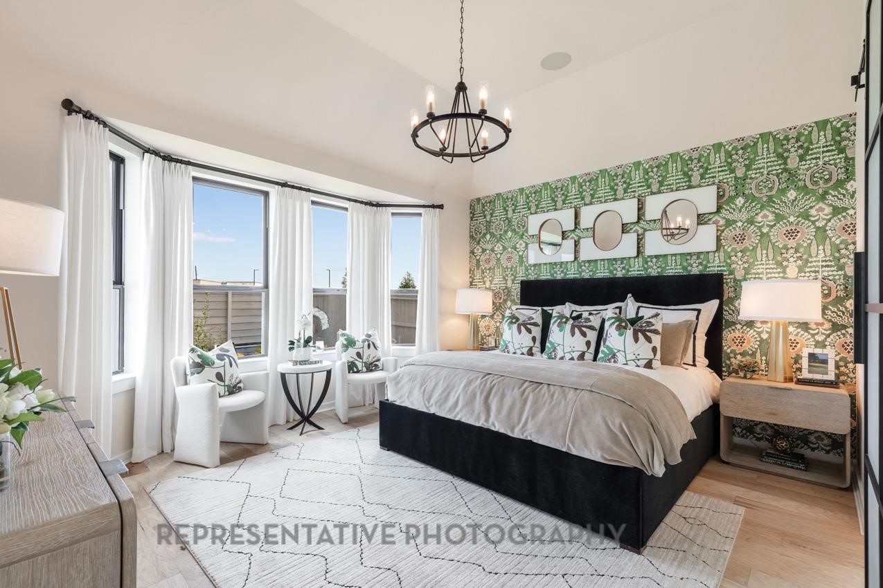 5327 Mango Blfs Street Manvel, TX 77578 - Photo 20 of 46 a bedroom with a large bed and a window