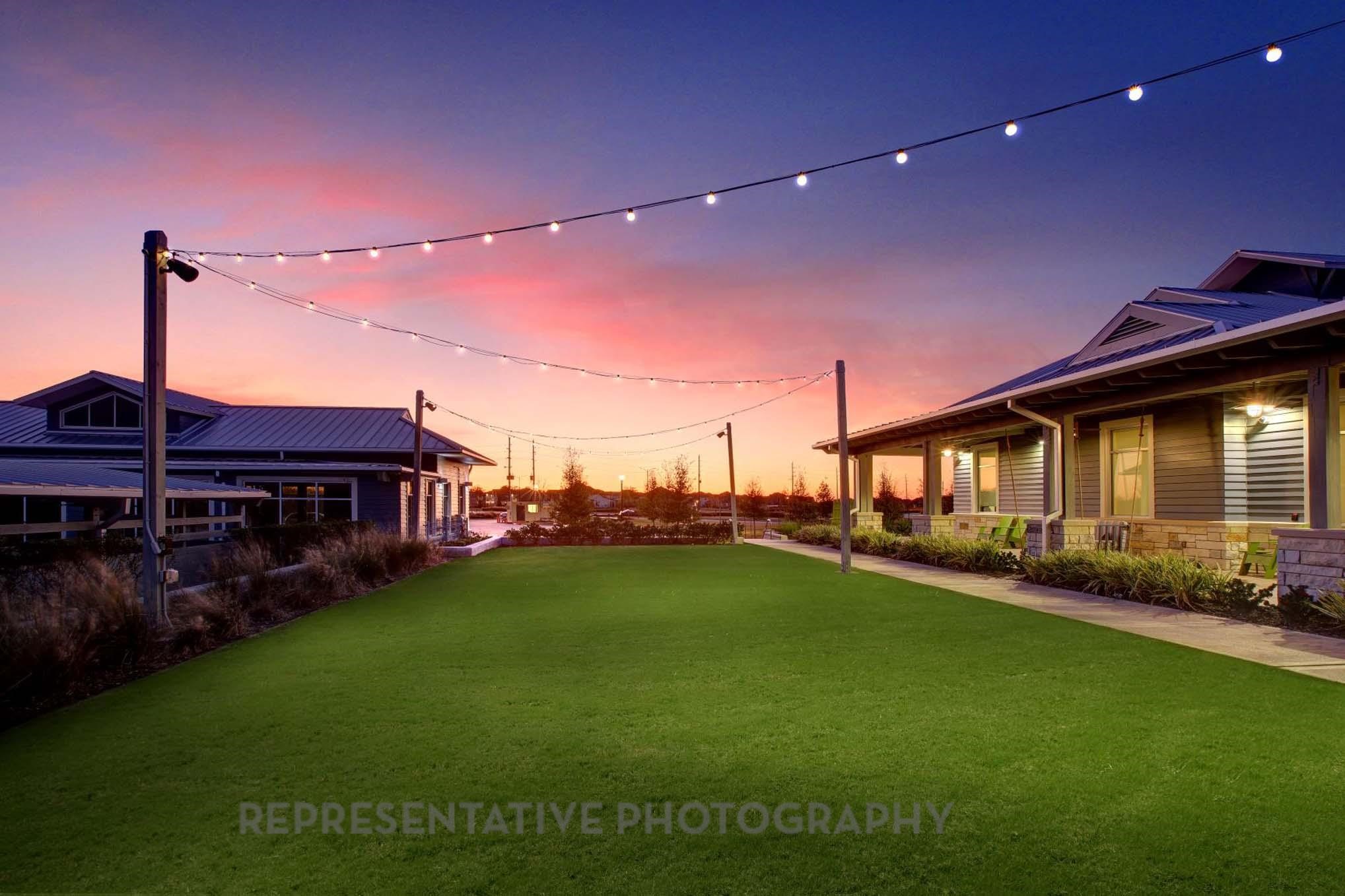 5327 Mango Blfs Street Manvel, TX 77578 - Photo 40 of 46 a view of a house with a backyard and a patio