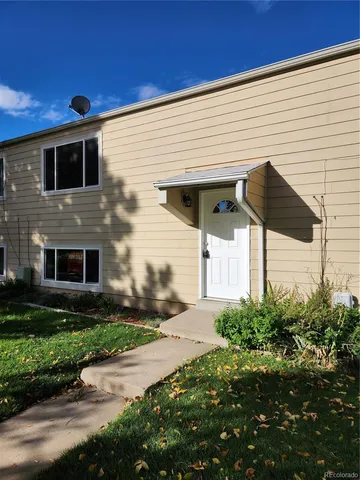 a view of a balcony with furniture