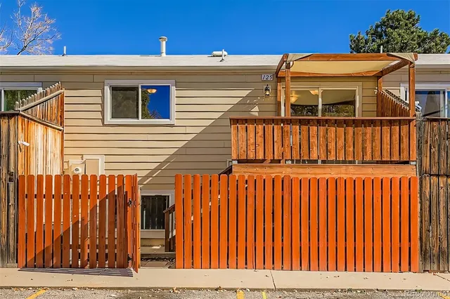 a view of balcony with wooden floor