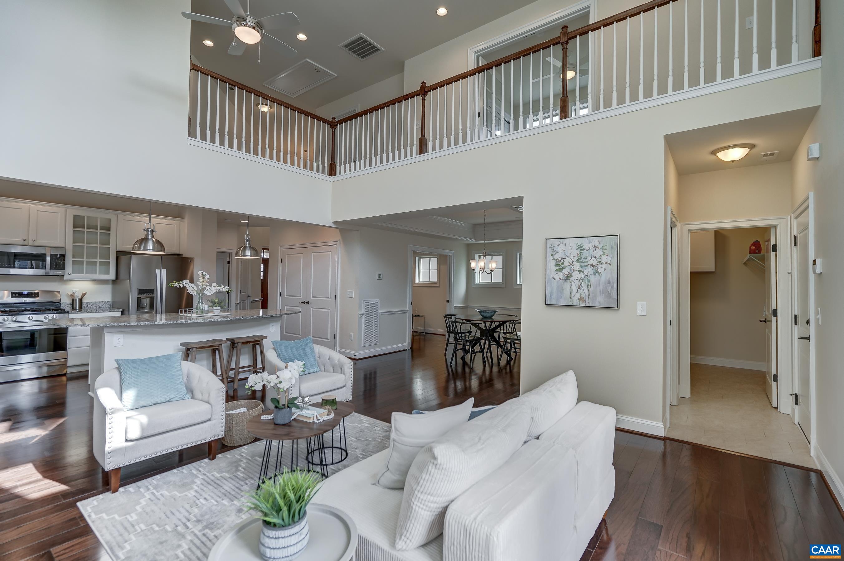 804 Golf View Drive Crozet, VA 22932 - Photo 17 of 62 a living room with furniture and wooden floor