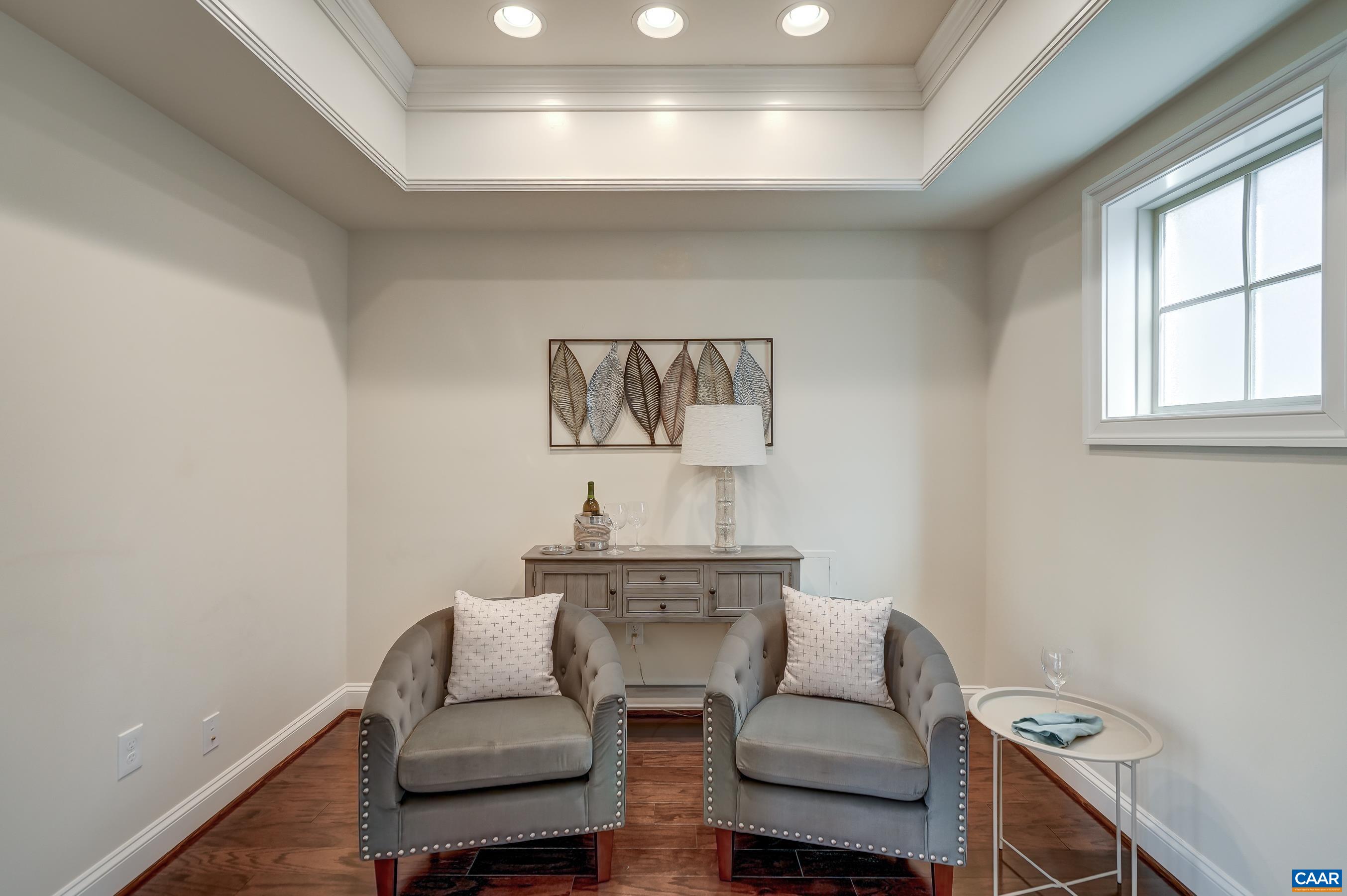 804 Golf View Drive Crozet, VA 22932 - Photo 23 of 62 a living room with furniture and a window
