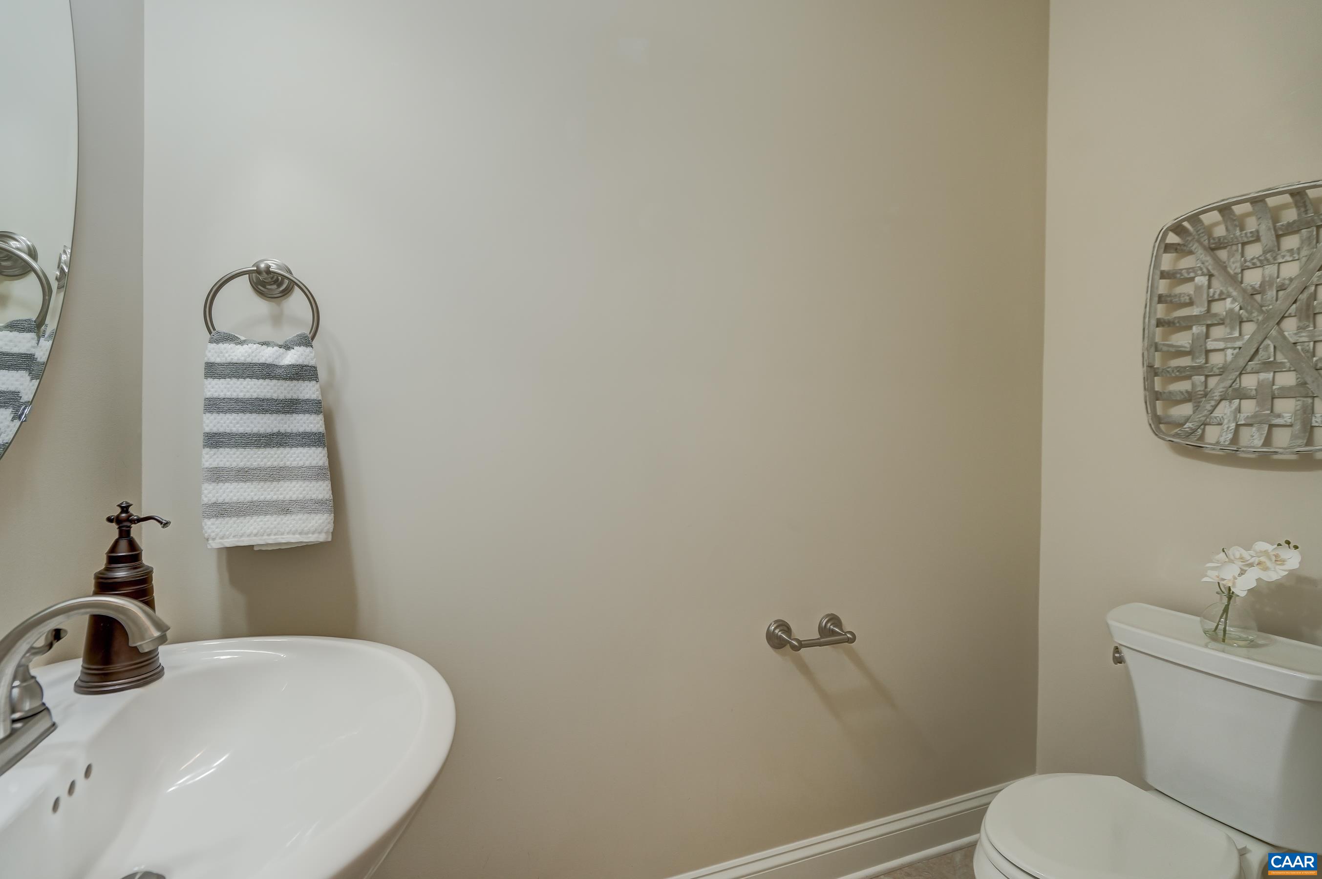 804 Golf View Drive Crozet, VA 22932 - Photo 24 of 62 a bathroom with a sink and a toilet