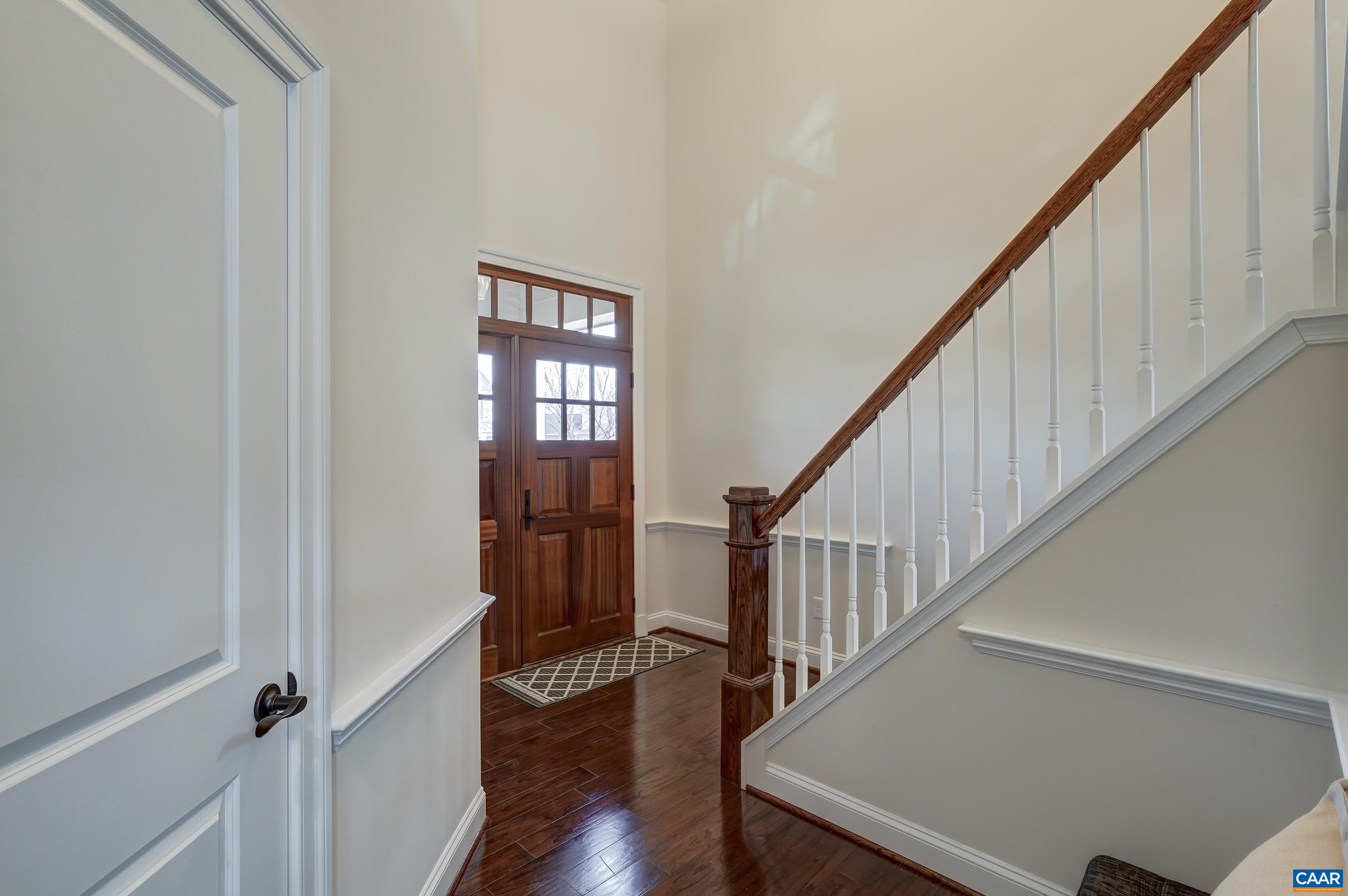 804 Golf View Drive Crozet, VA 22932 - Photo 5 of 62 a view of entryway with wooden floor and stairs