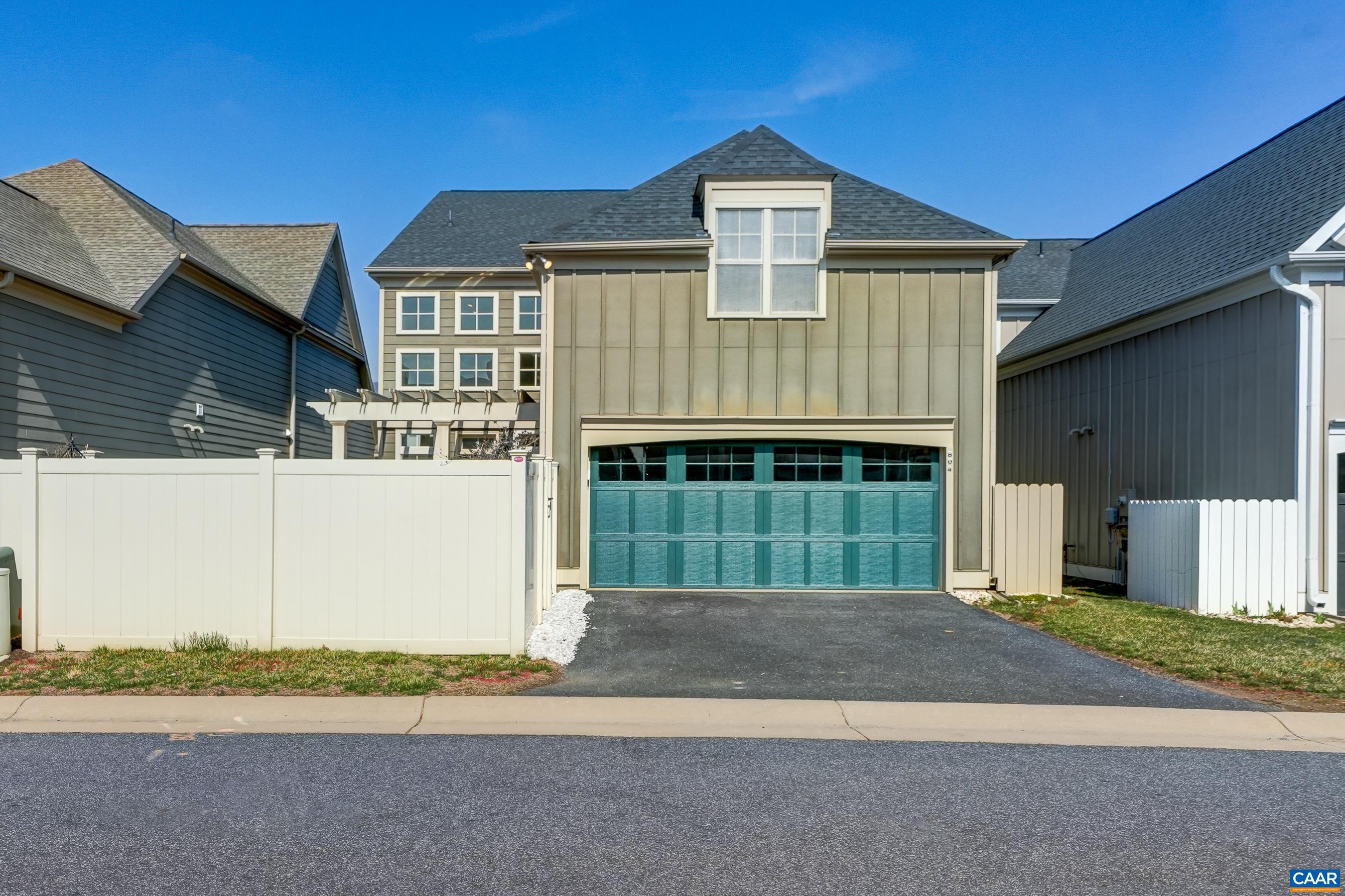 804 Golf View Drive Crozet, VA 22932 - Photo 58 of 62 a front view of a house with a yard and garage