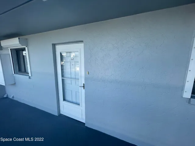 a view of hallway with front door