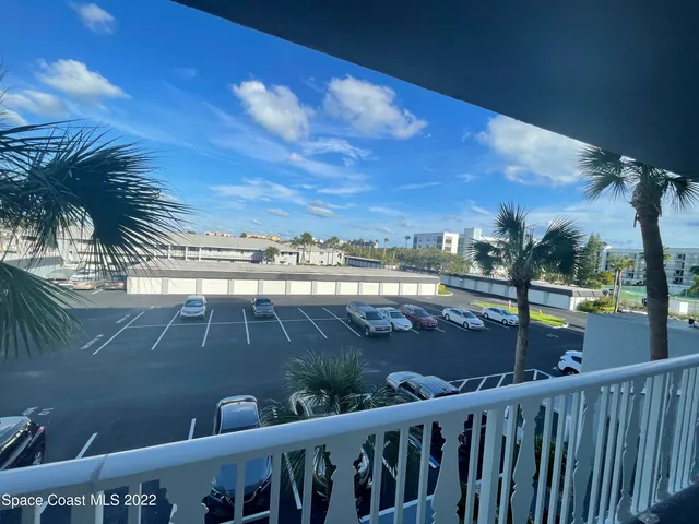 a view of a balcony with city view
