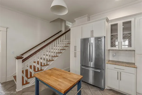 a kitchen with a sink and a window