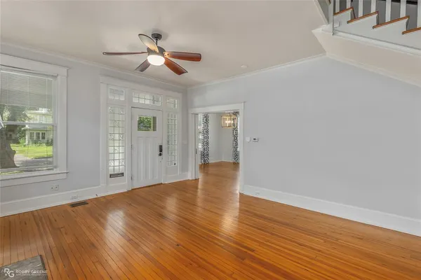 a kitchen with sink cabinets and window